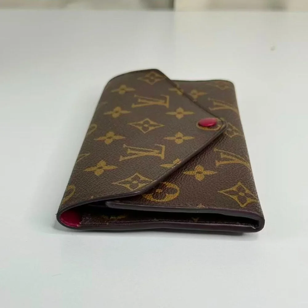 Louis Vuitton Monogram Canvas Wallet with Red Button Closure